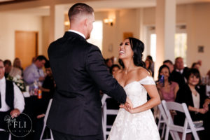 cincinnati photographer captures bride and groom during their first dance at rosewood manor