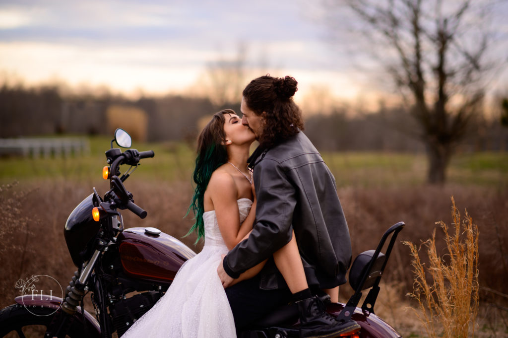 cincinnati wedding photographer captures couple on motorcycle at emmett ridge farm wedding venue