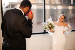 photographer captures couple on wedding day at sample space wedding venue 