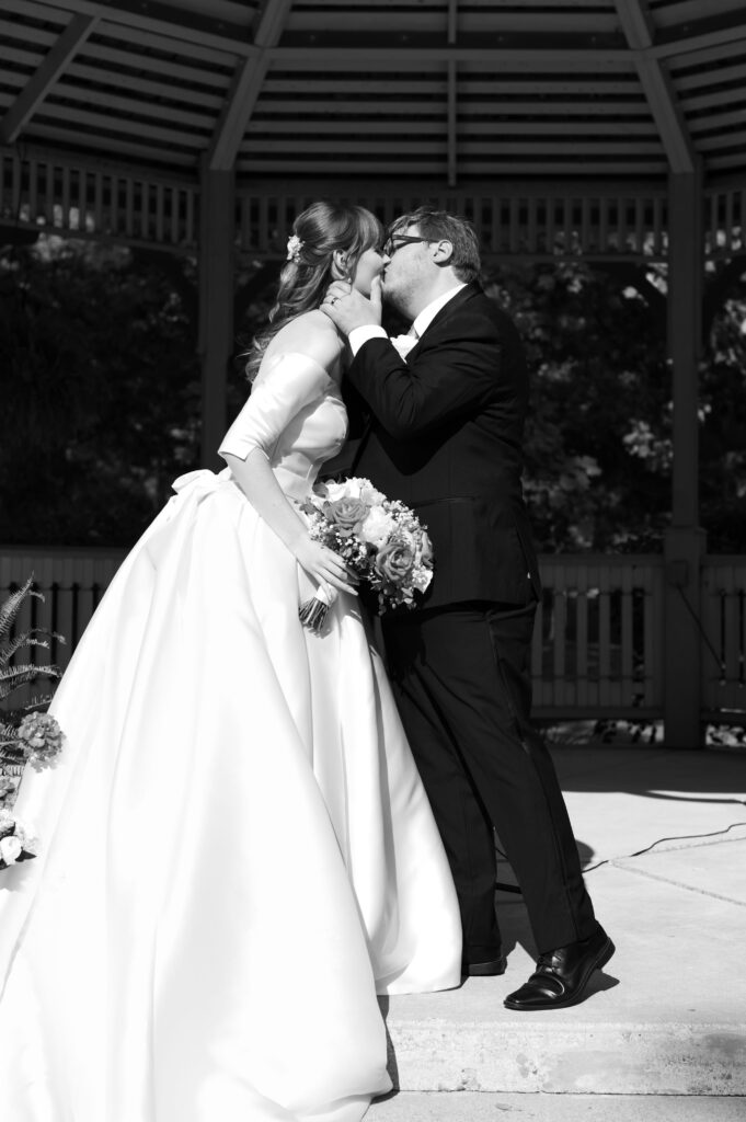 The bride and groom share a first kiss as husband and wife. 